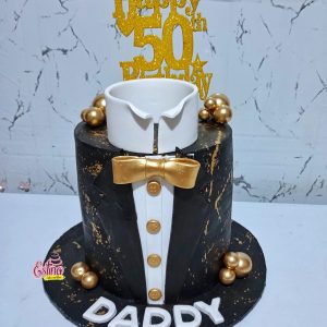 Celebrate the special gentleman in your life with the elegant Fondant Suit Cake from Estina Cakes and More. Crafted with precision and style, this cake is as sophisticated as it is delicious. Order now to make his occasion unforgettable!