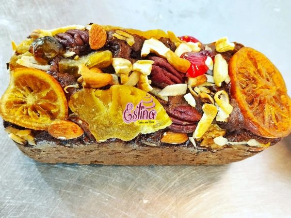 Celebrate the holiday season with the rich and flavorful Christmas Fruit Cake from Estina Cakes and More. Baked to perfection with premium ingredients, this timeless treat is perfect for sharing with family and friends. Order now to make your Christmas sweeter and more memorable!