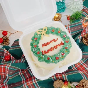 Indulge in the magic of the season with the Bento Christmas Cake from Estina Cakes and More. This elegantly crafted, single-serve cake is designed to bring festive cheer to your celebrations. Whether as a thoughtful gift or a personal holiday treat, our Bento Christmas Cake combines premium ingredients and artistic decoration to create a delightful experience.