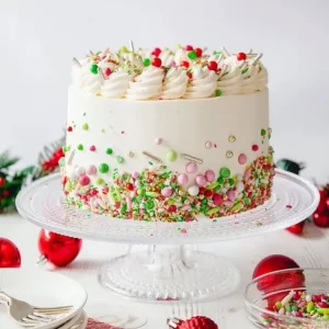 Add a splash of joy to your celebrations with the Christmas Funfetti Cake from Estina Cakes and More. Bursting with colorful sprinkles and festive flavors, it’s the perfect centerpiece for your holiday gatherings.
