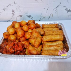 Enjoy a bite-sized treat with our Mini Small Chops Tray, a delightful assortment of tasty finger foods perfect for small gatherings, picnics, or casual snacking. This tray includes: 5 crispy samosas, filled with savory goodness. 5 golden spring rolls, with a deliciously crunchy exterior. 15 fluffy puff puffs, lightly sweetened and fried to perfection. 15 tender and juicy beef bites, perfectly seasoned for a mouthwatering experience. Ideal for 2-4 guests, this mini tray is your go-to for an authentic small chops experience in a compact, affordable package. Order now for a taste of perfection!